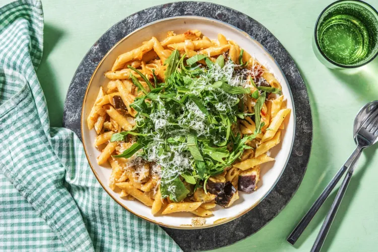 Penne with eggplant, semi-dried tomatoes and cheese
