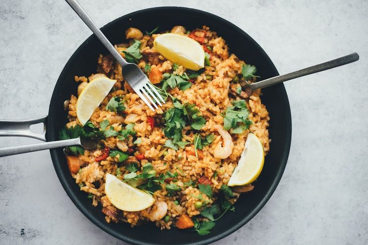 Chicken stir-fry with vegetables in a wok